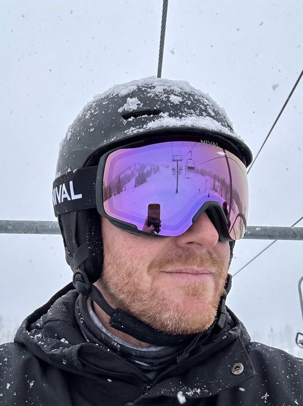 Rider wearing NIVAL heated goggles